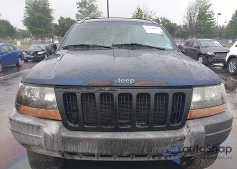 2000 Jeep Grand Cherokee Laredo из США, поврежденный, VIN 1J4GW48S7YC247210